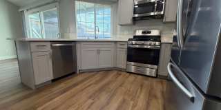 Available to Rent Today!!! Charming 4-Bedroom Home with Spacious Living Areas & Large Backyard! Gallery 21