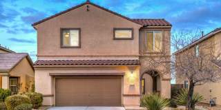 Two-Story Home in Anthem Highlands with Strip Views & Putting Green Gallery 1