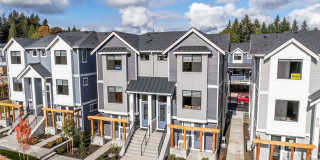 Stunning 4-Bedroom Townhome in Legacy Farms – Greenbelt Setting, A/C & 2-Car Garage Gallery 1