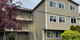 Bright & Spacious Top-Floor Condo in Greenwood! Gallery 1
