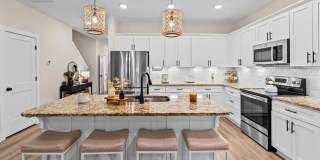 Like new modern maintenance free 3 bedroom 2.5 bath townhouse in Greensboro. Lawn care included. Gallery 8