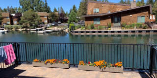 Secure your boat dock before summer!  Unfurnished 3 bed, 2 bath condo with marina and mountain views! Gallery 1