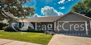 Contemporary Home With A Covered Patio & Quartz Countertops Gallery 1