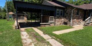 Charming 3-Bedroom Stone Home with Spacious Yard Gallery 3
