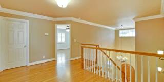Stunning two-story spacious home on tranquil tree-lined street. Gallery 38