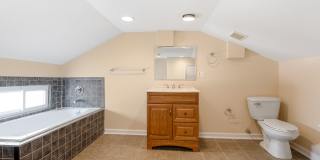 Spacious 2BR/2.5BA Townhome with Finished Basement & Extra Storage Gallery 34