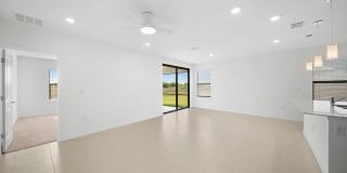 Newly constructed property offers four spacious bedrooms, two full bath in Lehigh Acres Gallery 11