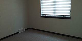 Three bedroom two bathroom Twin home w/ triple garage Gallery 14