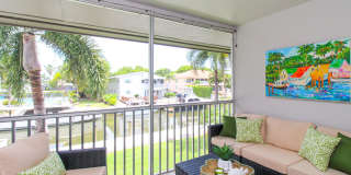 ** CANAL VIEW 2 BEDROOM\2 BATH CONDO ** SEASONAL OR ANNUAL ** BLUE POINT CLOSE TO DOWNTOWN NAPLES AND NAPLES BEAUTIFUL BEACHES ** CANAL BOAT SLIP AVAILABLE ** Gallery 1