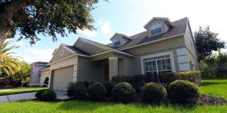 Beautiful 4-Bedroom Home in Gated Golf Community – East Orlando Gallery 1