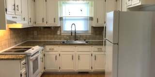 Travelers Rest !! 3 BR, 2 BA with Great Living Space - Den, Bonus Room, Primary Suite has a HUGE walk in Closet, Laundry Room, private screened in porch & deck AND a storage shed out back.  Fresh Paint and New LVP Floors Gallery 10