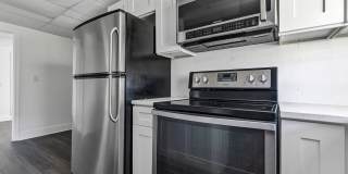 Bright & Updated 2BR Bottom Unit Duplex | White Kitchen & Stainless Appliances in Saint Petersburg Gallery 10