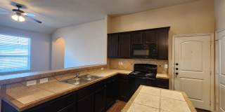 Wood Like Tile Flooring & Vinyl Plank - No Carpet / 1 Story Unit/ Fenced in Yard / Interior Washer Dryer Connections / CISD Gallery 11