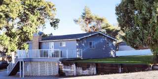 Spacious 4-Bedroom, 2-Bath Home with Daylight Basement, Large Yard & Two Fireplaces!. Gallery 1