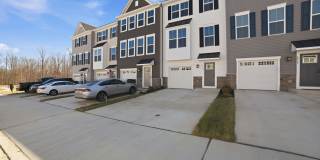 This home presents a harmonious blend of elegance, flexibility, and modern convenience within a welcoming community setting. Gallery 4