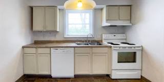 PRELEASING for AUGUST! Walk to Ball State! Bright 4BR Home with Fireplace Gallery 1