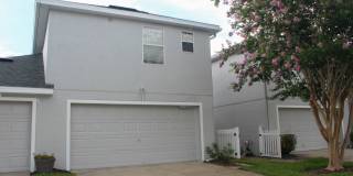 MOVE IN MAY-Water & electricity included 1x1 above garage apartment!! Full kitchen & bathroom!! Washer & dryer! Separate entrance in back! Gallery 1