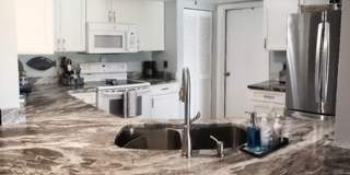 Updated and tastefully Furnished/Turnkey 2-bedroom 2 bath, 2nd floor condo is available mid-April 2026 to End of December 2026 Gallery 5