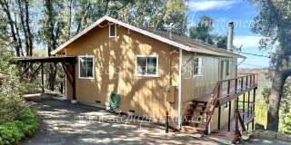 Charming 3-Bedroom Retreat with Modern Updates and Scenic Views in Ponderosa Hills Gallery 1