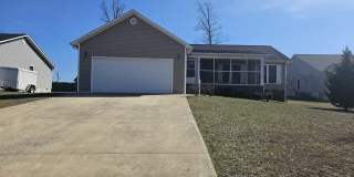 Spacious 3-Bedroom Home in Crossville with 2-Car Garage, Fenced Yard & Porches Gallery 1