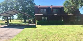 FFOR LEASE in BROCK! 3 BR- 2 BA - 2 Car Carport + Loft + Office - 2,256 sf Log Home on Approximately One Acre in Brock ISD. Gallery 1