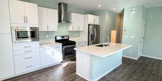 MOVE-IN READY — PET-FRIENDLY 2-BEDROOM HOME WITH GARAGE & PRIVATE EV CHARGER Gallery 1