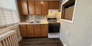 Classic 2-BR Rowhouse with Exposed Brick in Hunting Park Gallery 16