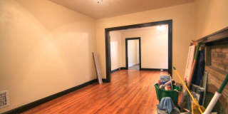 This 2 bedroom 1 bath home has been completely refinished with brilliant hardwood floors throughout! Gallery 5
