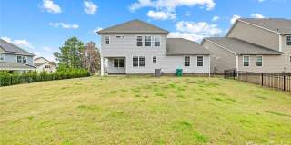 Rare 2023-built home on an oversized 0.35-acre lot in one of Waxhaw's most sought-after communities — zoned for the 9/10-rated Waxhaw Elementary School and move-in ready today. Gallery 12