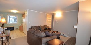 Blue River Condo! Bus route and additional storage! Year lease!  Unfurnished Gallery 1