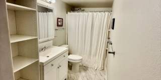 Furnished and Utilities Included: Two-Bedroom Basement Apartment with Private Yard Gallery 13