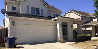 A must see 4/3 with a bedroom downstairs for convenience. Gallery 1