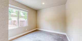 Bright 2 Bedroom, 1 Bathroom Single Family Home! Attached 2 Car Garage and Landscaping Included! Gallery 21