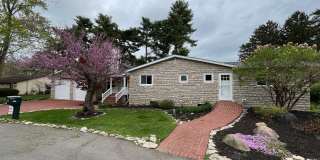 **RIVERFRONT 4-BEDROOM/2-BATH WITH 4-CAR GARAGE, FULL BASEMENT!!** Gallery 1