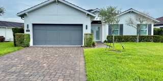 Rare Lakefront Pool Home in Exclusive Gated Sandhill Lake – Resort-Style Living Awaits Gallery 1