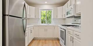 Downstairs 1 bedroom apartment with small patio and additional storage Gallery 1