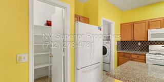NW!! 4 Bedrooms!!! All Tile and Pergo flooring T/O!! NO Carpet!!! Low Maintenance Desert landscaping front and back!! With Patio cover in back!!! Gallery 19