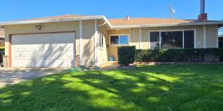 Single Family Home, Quartz Countertops, Fresh Paint, Wood Floors, New Carpet, New Windows, Patio with Yard! Gallery 1