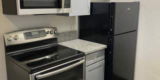 Fairview Village Apartments professionally managed by Grindstone Property Management LLC Gallery 1