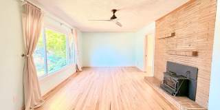 Charming Updated 1950s Home with Refinished Hardwoods & Large Fenced Yard – Landscaping Included! Gallery 9