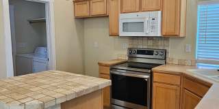 3bed/2bath w/3 car garage, upstairs bonus room, vaulted ceilings, & fenced yard. Gallery 11