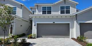 Seasonal Short-Term 3 Bedroom 2 Bathroom Coach Home in Wellen Golf & Country Club! Gallery 1