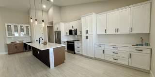 Brand-New Waterfront Luxury in Cape Coral | Heated Pool, Spa, Outdoor Kitchen & 3-Car Garage Gallery 8