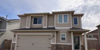 Move-in Ready with a fenced yard and Rec Center access! Gallery 1