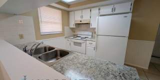 2/2- Bonus room, all tile floors, NEW KITCHEN & BATH RENOVATION!! Gallery 1