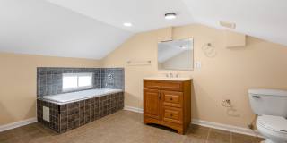 Spacious 2BR/2.5BA Townhome with Finished Basement & Extra Storage Gallery 35