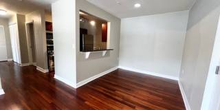 MOVE IN NOW!! Gated community Miriada! 1st floor 1X1.5 bath condo near pool area!!! Laminate wood flooring in living area and carpet in bedroom! Has washer & dryer! Gas stove & water heater! Gallery 7