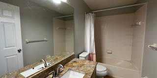 Beautiful Townhome in a gated community with assigned parking spots and a community pool Gallery 6