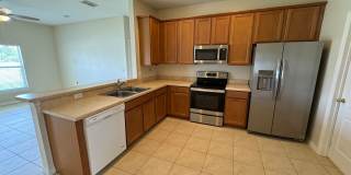 Beautiful 3/2 home near Lake Nona ~ Fenced In Yard ~ LVP & Tile Flooring ~ Community Pool! Gallery 11