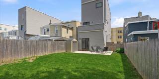 Detached Luxury 4BR/3B Retreat with Skyline Rooftop Deck, Wet Bars, Driveway & Massive Yard Gallery 26